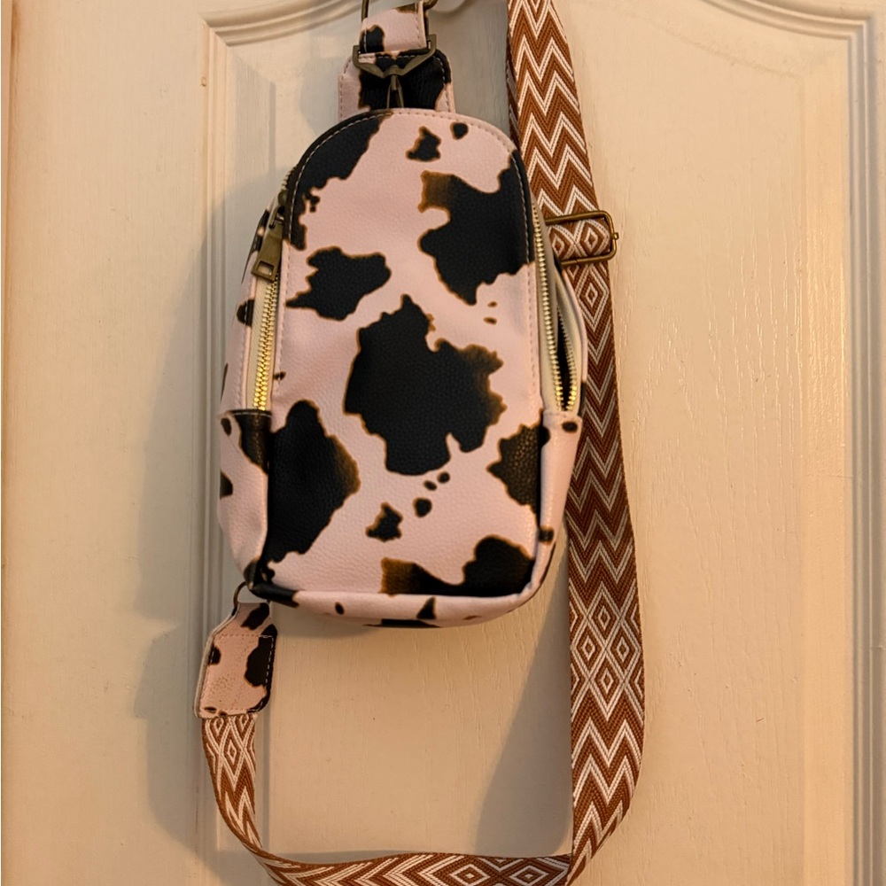 Pink Cow-Print Crossbody Bag with Patterned Strap